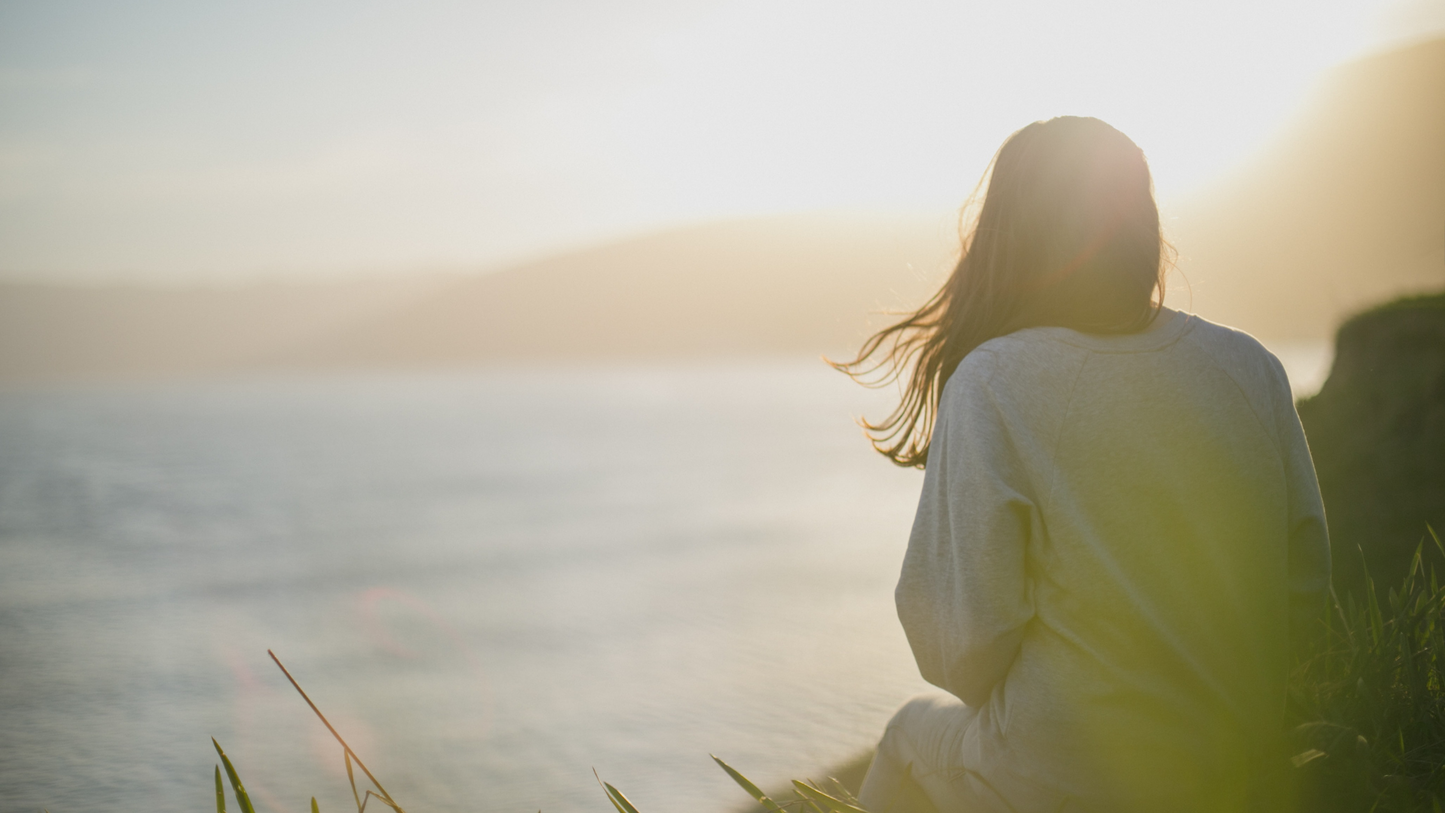 girl facing the sunrise