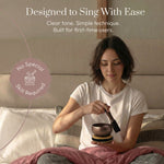 Playing the Polished Harmony singing bowl with the wooden striker: designed to sing with ease