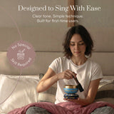 Playing the Tranquil Aura singing bowl with the wooden striker: designed to sing with ease