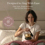 Playing the Golden Stillness singing bowl with the wooden striker: designed to sing with ease