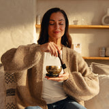 Golden Serenity singing bowl in a calm moment at home